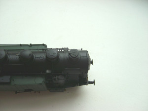 Дымовая труба закрывается поворотной задвижкой.